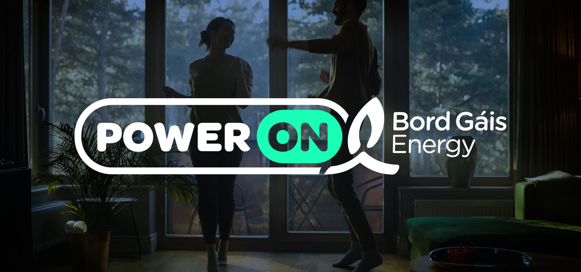 A man and woman dancing in front of a window of the power on blog for bord gais energy